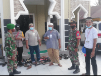 Babinsa Mempawah Hilir Laksanakan Bantuan Pengamanan Venue MTQ XXXI di Desa Pasir